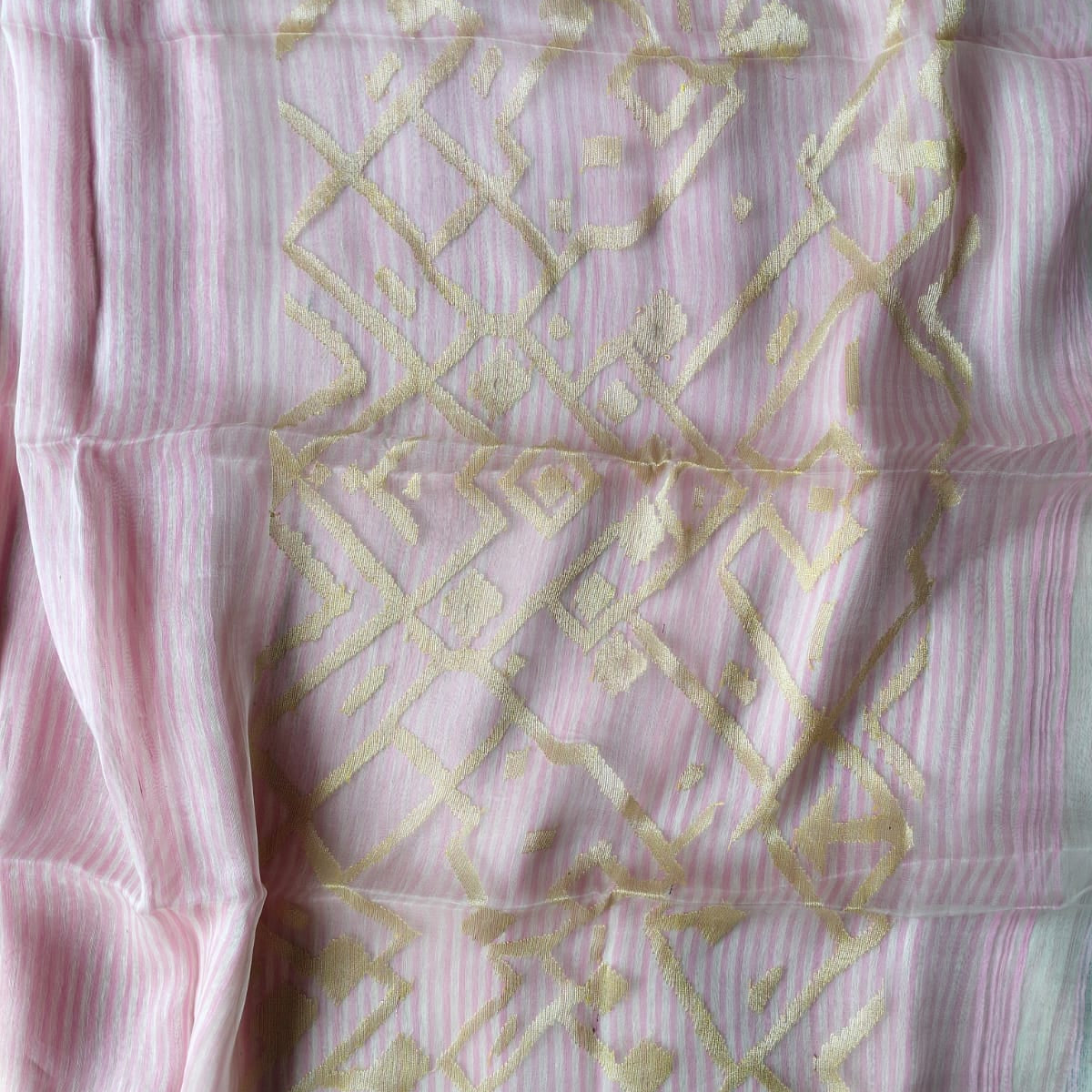 Handwoven pink and white striped silk linen saree with pure muslin palla with intricate jamdani work. Perfect for special occasions and celebrations.
