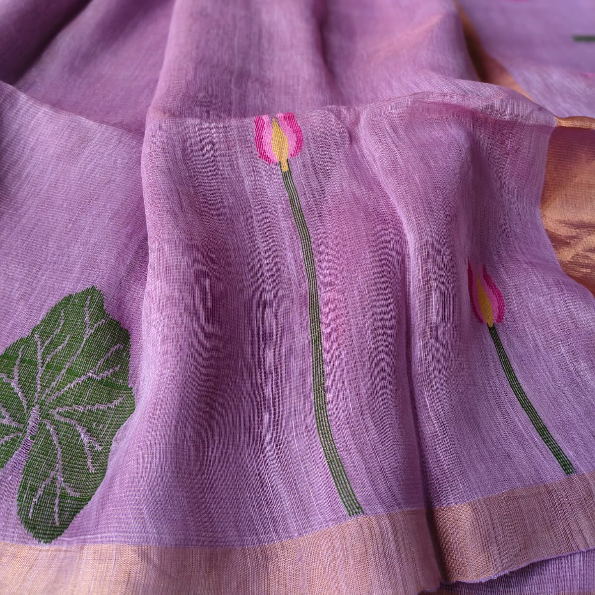 Handloom tissue linen saree with lotus motif