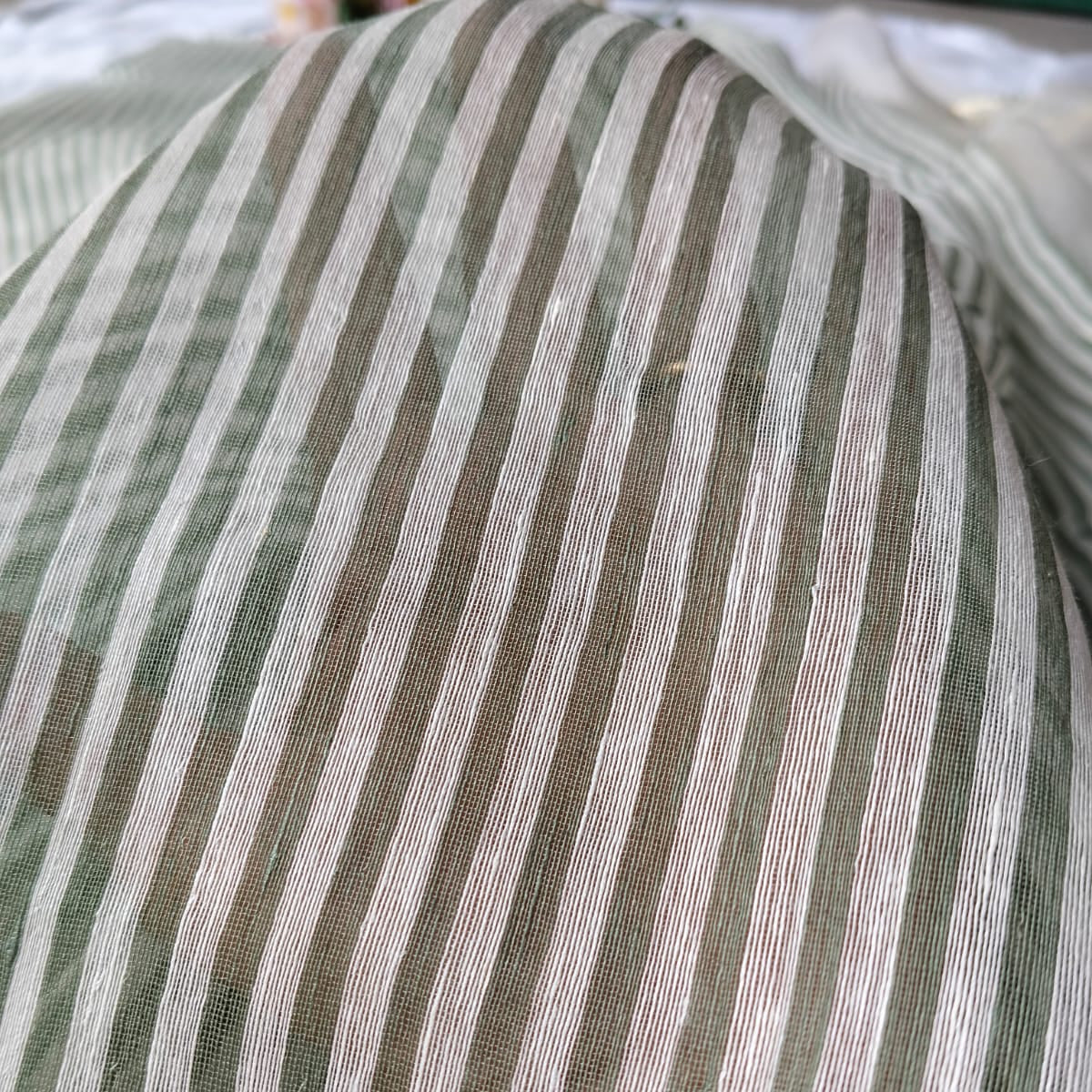 Handloom pure silk linen saree in vertical stripes.  Perfect for festivals, weddings, and special occasions.